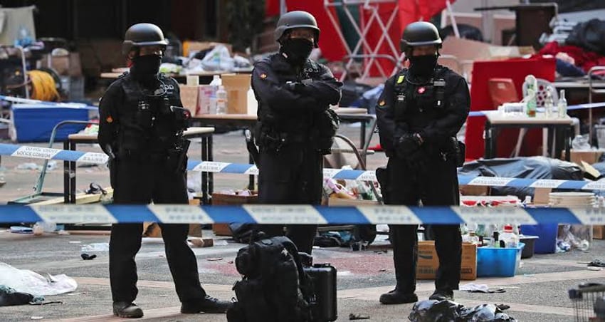 Hong Kong police move to end two weeks siege of university