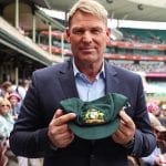 Shane Warne auctions baggy green for bush fire victims