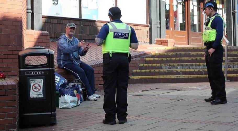 UK man jailed for coughing on police official