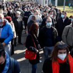 People wait to receive a dose of the AstraZeneca vaccine at Belgrade Fair makeshift vaccination centre in Belgrade, Serbia, Source: AP/ Al-Jazeera