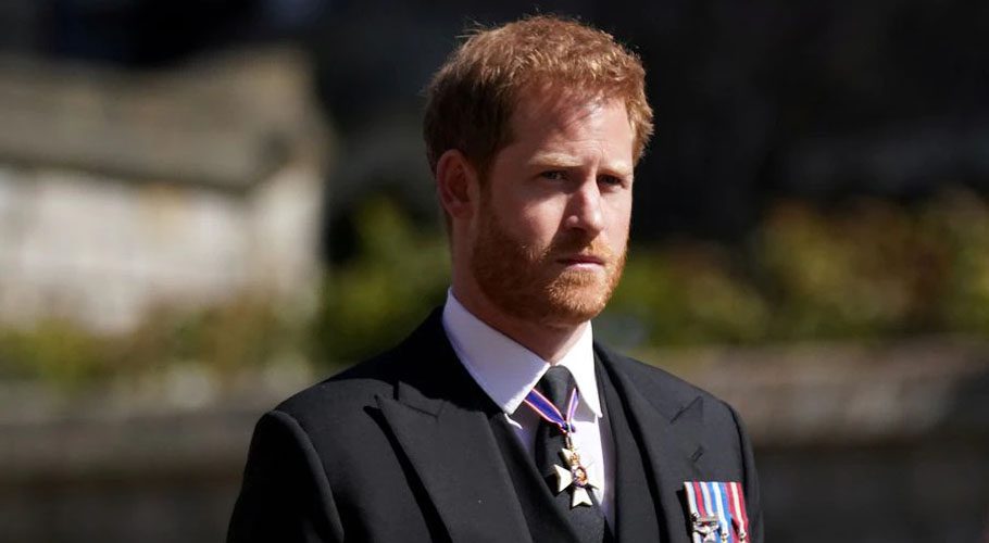 Britain's Prince Harry walking in the procession at Windsor Castle during the funeral of Prince Philip, who died at the age of 99. Source: Reuters