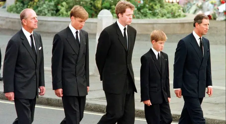 Prince William, Earl Spencer, Prince Harry, and Prince Charles walk outside Westminster Abbey during the funeral service for Princess Diana in September 1997. Source: AFP/Getty Images