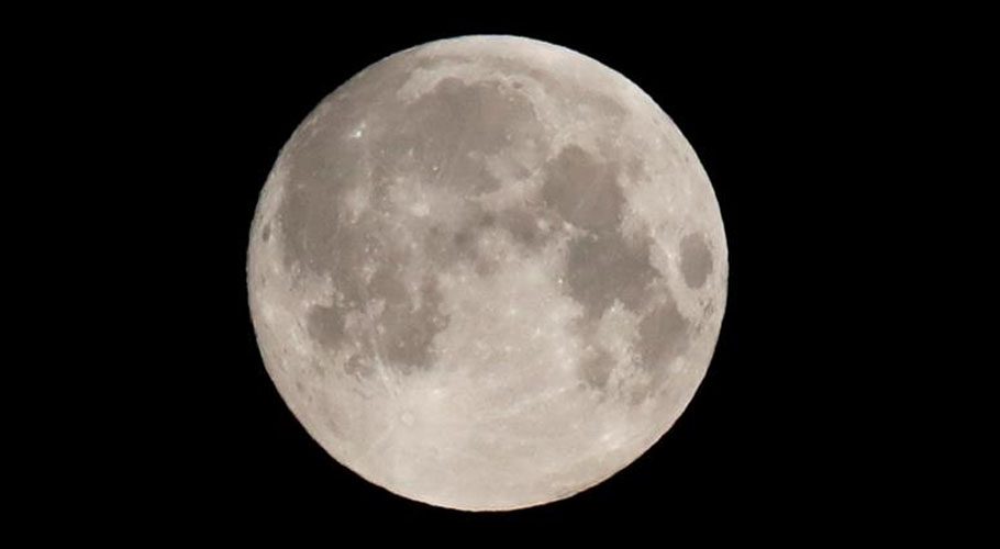  The full moon, known as the "Super Flower Moon", is seen in the skies near Amesbury, Britain. Source: Reuters 
