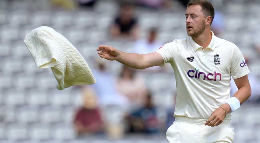 Ollie Robinson suspended from international cricket over racist tweets
