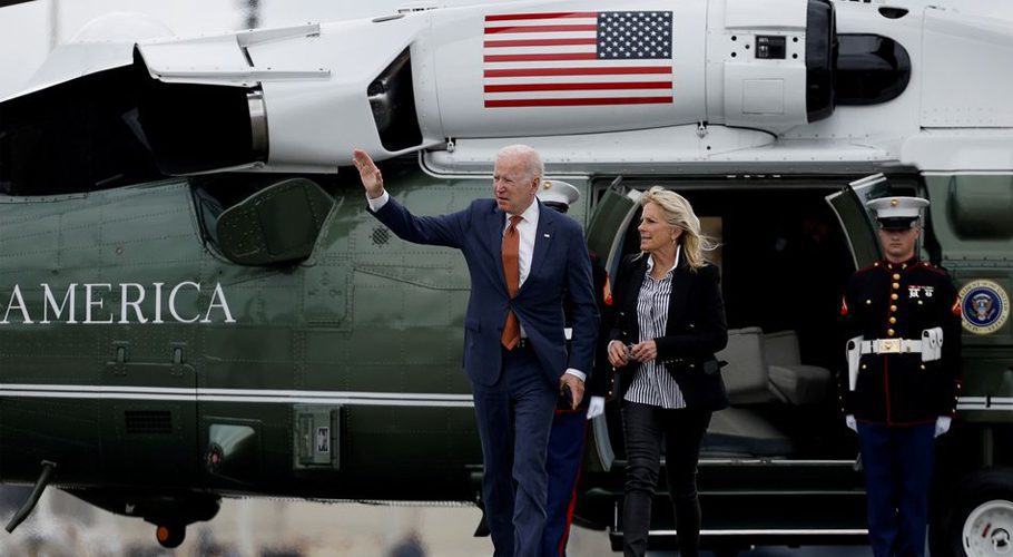 US President Joe Biden and first lady Jill Biden walk from Marine One to board Air Force One for return travel to Washington, Source: Reuters