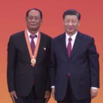 Chinese President Xi Jinping presents the July 1 Medal to one of the recipient in Beijing. Source: CGTN