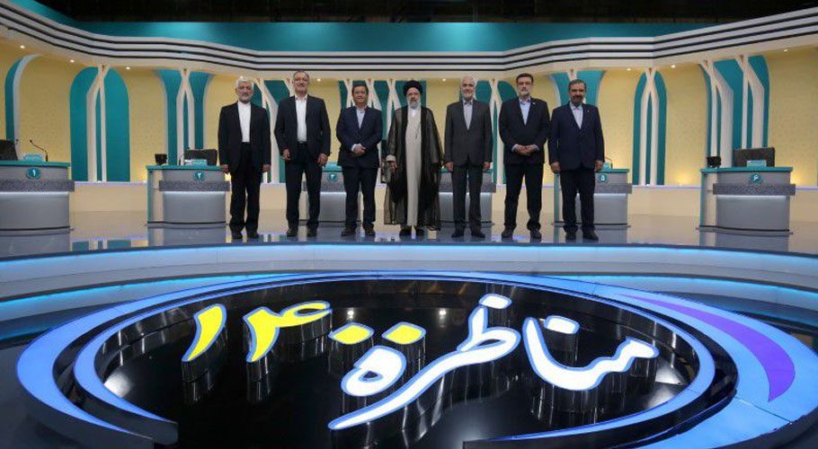 Iran's presidential candidates stand after the election debate at a television studio. Source: Reuters