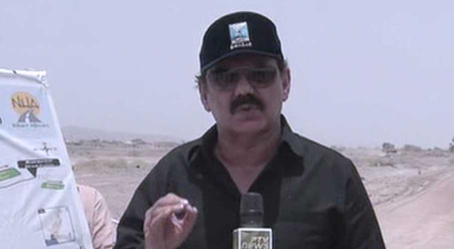 Asim Saleem Bajwa speaking to the media in Hoshab, Balochistan.
