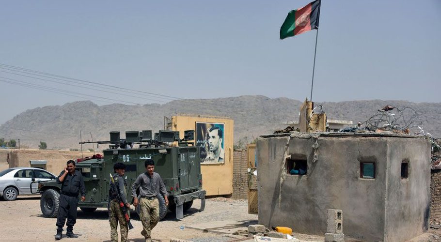 Afghan security forces inspect the site of a car bomb attack in Kandahar province. Source: Reuters