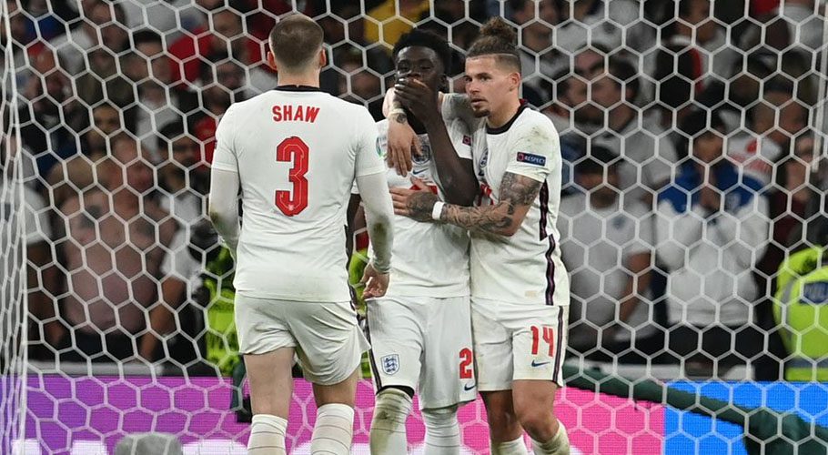England's Bukayo Saka, Luke Shaw and Kalvin Phillips look dejected after a penalty shootout. Source: Reuters