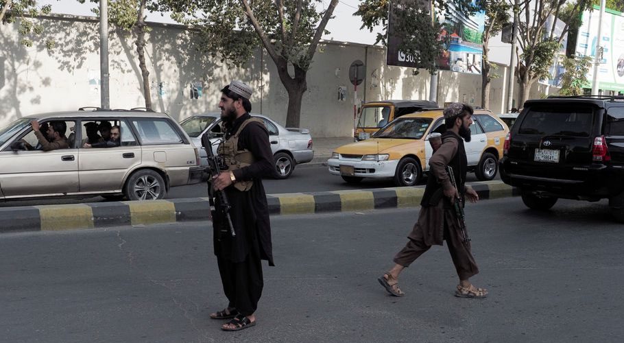 Taliban fighters guard a check-point on a main street in Kabul. Source: Reuters.