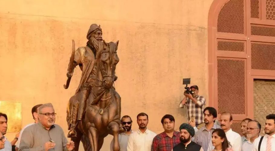 A man is said to be a TLP worker who pulled down the statue of Ranjit Singh (Photo: Times of India)