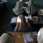 Afghan girls sit in a classroom at a school in Kabul. Source: Reuters.