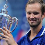 Daniil Medvedev of Russia celebrates with the championship trophy after his match against Novak Djokovic of Serbia. Source: Reuters.