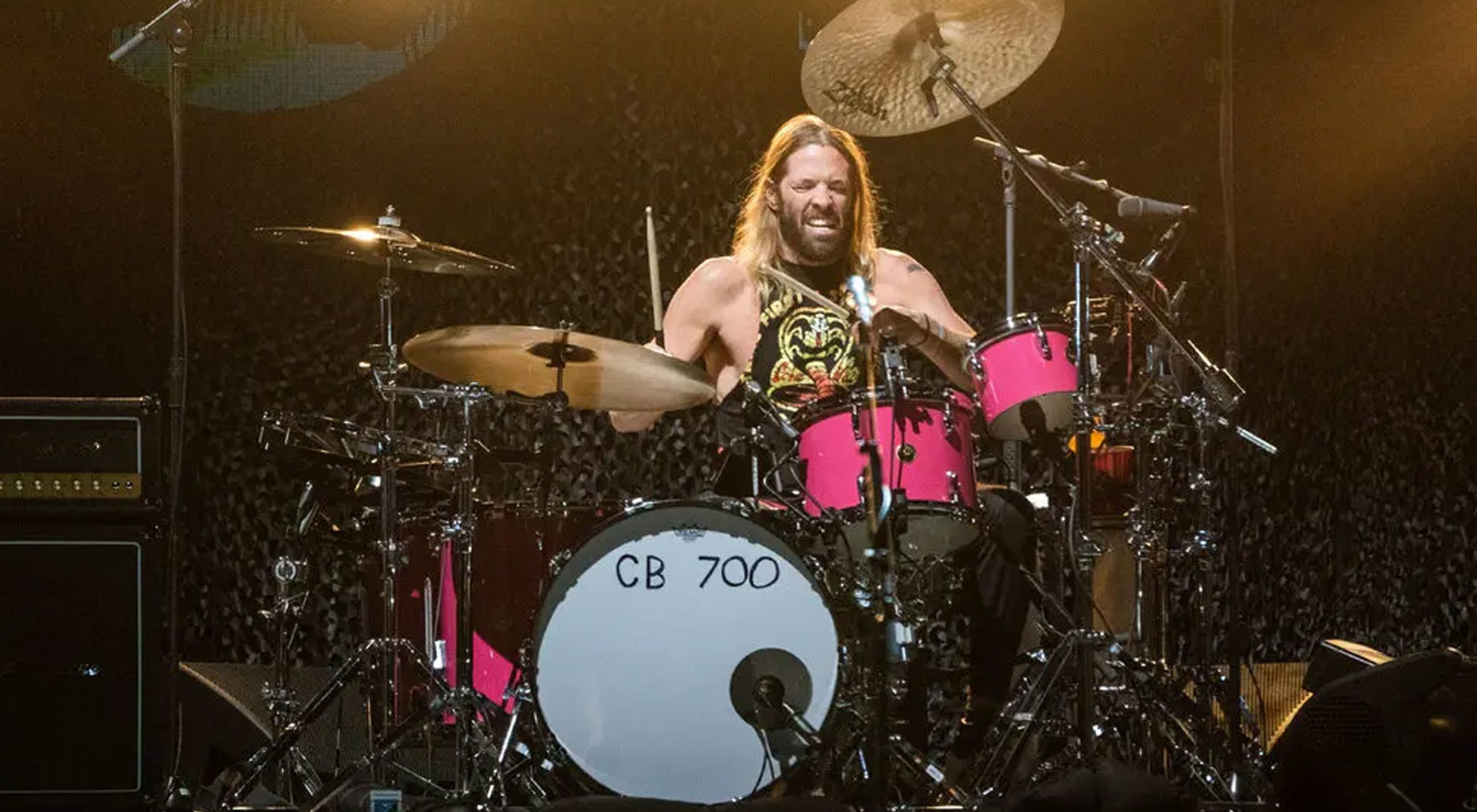 He died during a South American tour with the rock band.