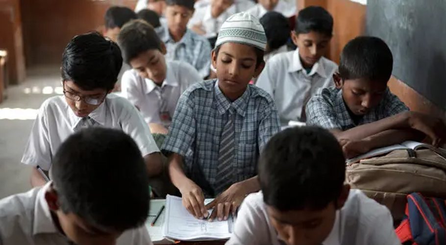 Poverty and child labour can lead boys to drop out. Source: TIME.