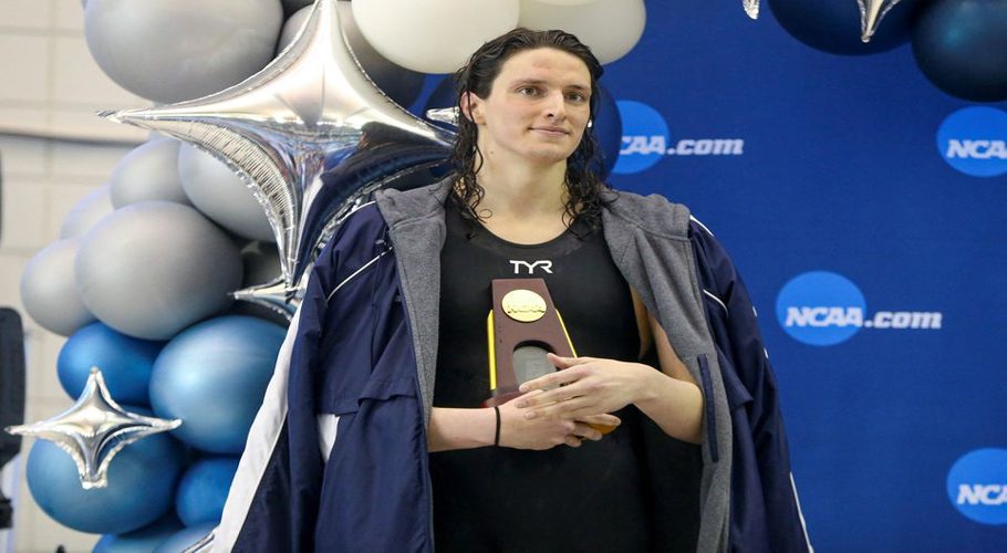 Mar 17, 2022; Atlanta, Georgia, USA; Penn Quakers swimmer Lia Thomas holds a trophy after finishing first in the 500 free at the NCAA Womens Swimming & Diving Championships at Georgia Tech. Mandatory Credit: Brett Davis-USA TODAY Sports