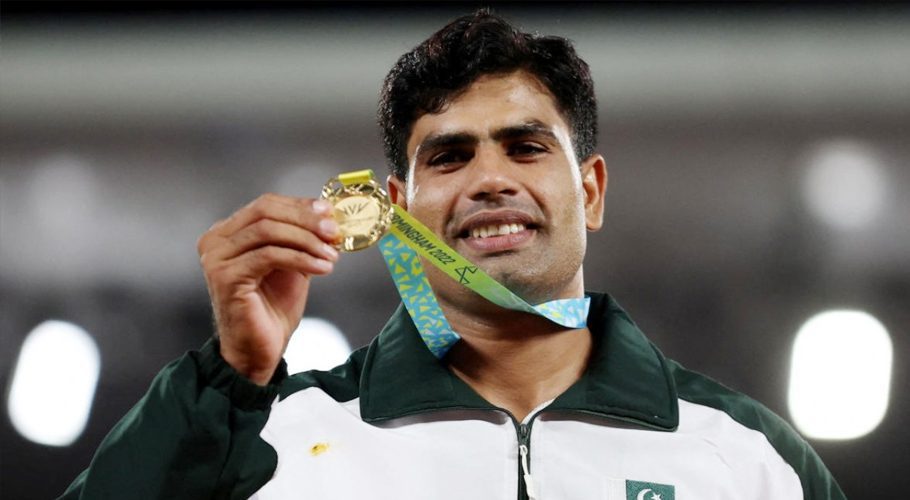 Gold medallist Pakistan's Arshad Nadeem celebrates on the podium. Credit: Reuters Photo
