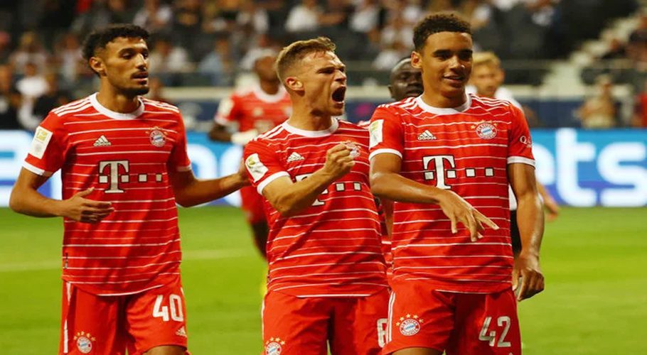 Bayern Munich’s Jamal Musiala celebrates scoring their sixth goal with Joshua Kimmich and Noussair Mazraoui during their Bundesliga match against Eintracht Frankfurt at Deutsche Bank Park, Frankfurt on Friday. (Reuters)