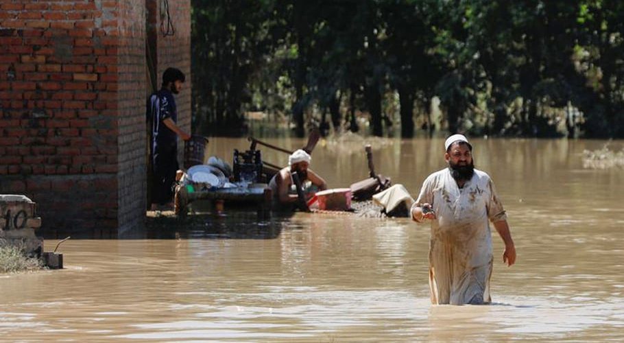 According to the preliminary survey, 1400 km of roads have been swept away by flood water while 87,000 houses, 1458 schools, 552 health centers, 549 water supply units, over 2,000 water channels were destroyed. (Image: AFP)