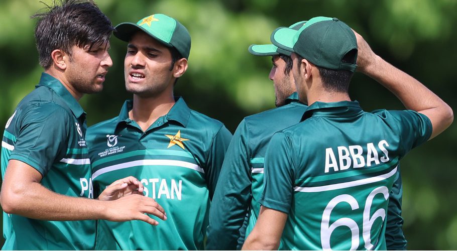 Pakistan U19 players celebrate after taking a wicket during a game in U19 World Cup 2022. (Image: TWITTER @CRICKETWORLDCUP)