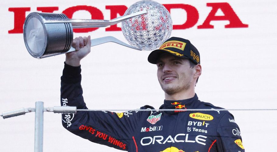 Red Bull's Max Verstappen celebrates winning the race and the championship on the podium. Formula One F1 - Japanese Grand Prix - Suzuka Circuit, Suzuka, Japan - October 9, 2022 REUTERS/Issei Kato