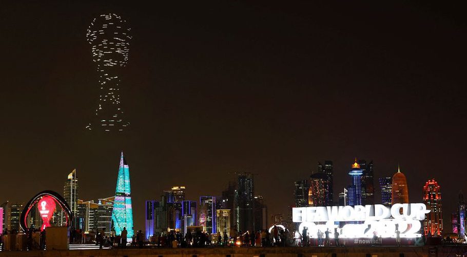 FIFA World Cup Qatar 2022 - A drone show with the World Cup trophy on display is seen above the skyline of Doha, Qatar - November 15, 2022. REUTERS/Kai Pfaffenbach