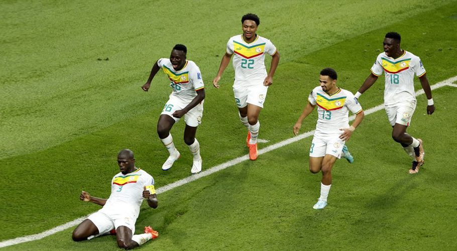 FIFA World Cup Qatar 2022 - Group A - Ecuador v Senegal - Khalifa International Stadium, Doha, Qatar - November 29, 2022 Senegal's Kalidou Koulibaly celebrates scoring their second goal with teammates REUTERS/Issei Kato