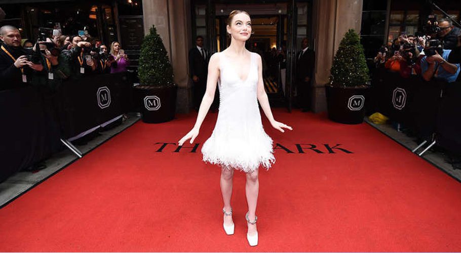 Emma Stone and her Met Gala-chosen Louis Vuitton. (Image credit: Showbizz Daily)