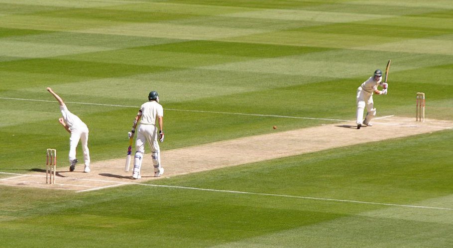 Shaun Pollock of South Africa bowls to Michael Hussey of Australia during the 2005 Boxing Day Test match at the Melbourne Cricket Ground. (Wikipedia)
