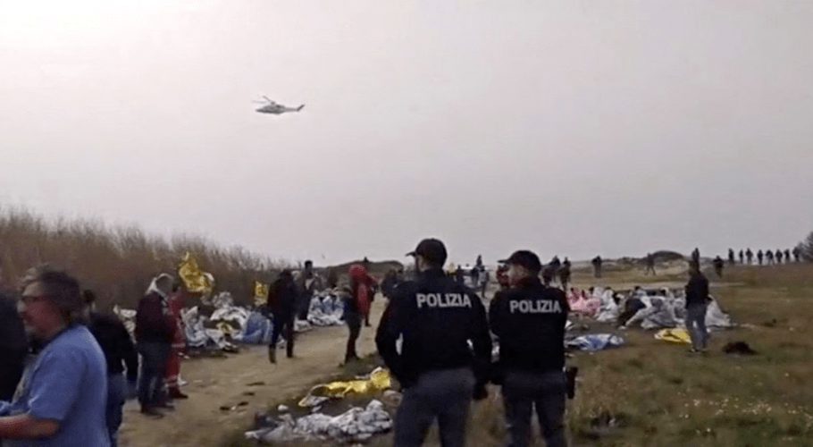 A screengrab taken from a video shows police officers standing at the beach where bodies of believed to be refugees were found after a shipwreck, in Cutro, the eastern coast of Italy’s Calabria region, Italy, February 26, 2023. — Italian Police/Handout via Reuters