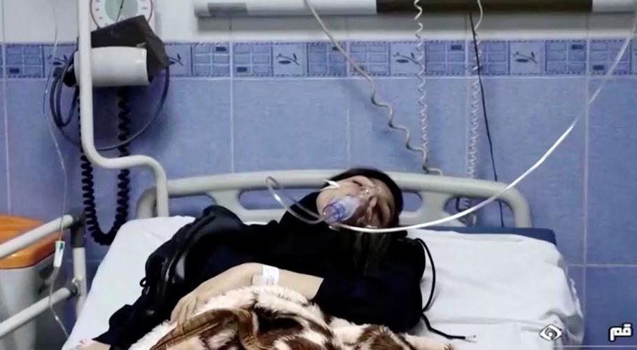 A young woman lies in hospital after reports of poisoning at an unspecified location in Iran in this still image from video from March 2, 2023. WANA/Reuters TV via REUTERS