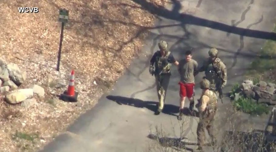 [1/7] FBI agents arrest Jack Teixeira, an employee of the U.S. Air Force National Guard, in connection with an investigation into the leaks online of classified U.S. documents, outside a residence in this still image taken from video in North Dighton, Massachusetts, U.S., April 13, 2023. WCVB-TV via ABC via REUTERS