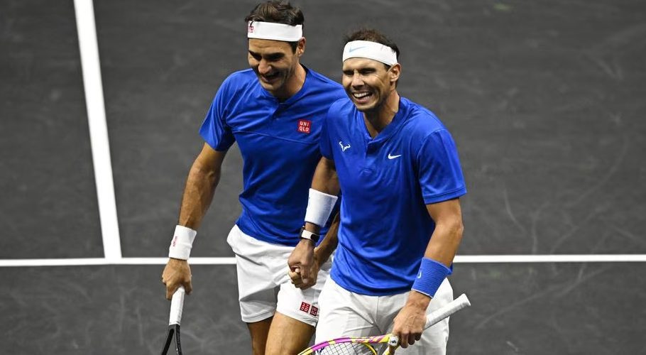Tennis - Laver Cup - 02 Arena, London, Britain - September 24, 2022 Team Europe's Rafael Nadal and Roger Federer during their doubles match against Team World's Jack Sock and Frances Tiafoe REUTERS/Dylan Martinez