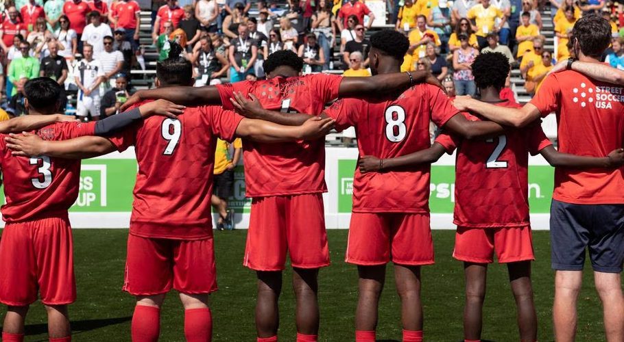 American players sing the national anthem during the Homeless World Cup, an international soccer competition for people living without permanent shelter or in rehab centers, at the Hornet Stadium in Sacramento, California, U.S. July 8, 2023. REUTERS/Laure Andrillon