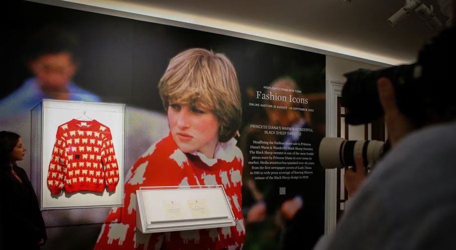 A 'black sheep' jumper worn by the Britain's late Diana, Princess of Wales, is displayed at Sotheby's, in London, Britain, July 17, 2023. The jumper, which is to go up for auction, was worn by Diana on several occasions, and was recently rediscovered in a box in the attic of the manufacturers along with correspondence from Diana's private secretary. REUTERS/Rachel Adams Read less