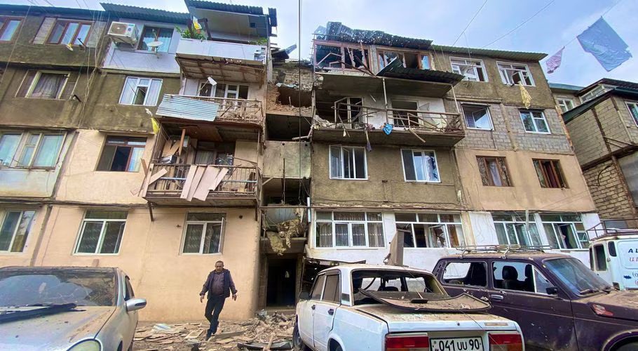 A view shows a damaged residential building and cars following the launch of a military operation by Azerbaijani armed forces in the city of Stepanakert in Nagorno-Karabakh, a region inhabited by ethnic Armenians, September 19, 2023. Siranush Sargsyan/PAN Photo via REUTERS Acquire Licensing Rights