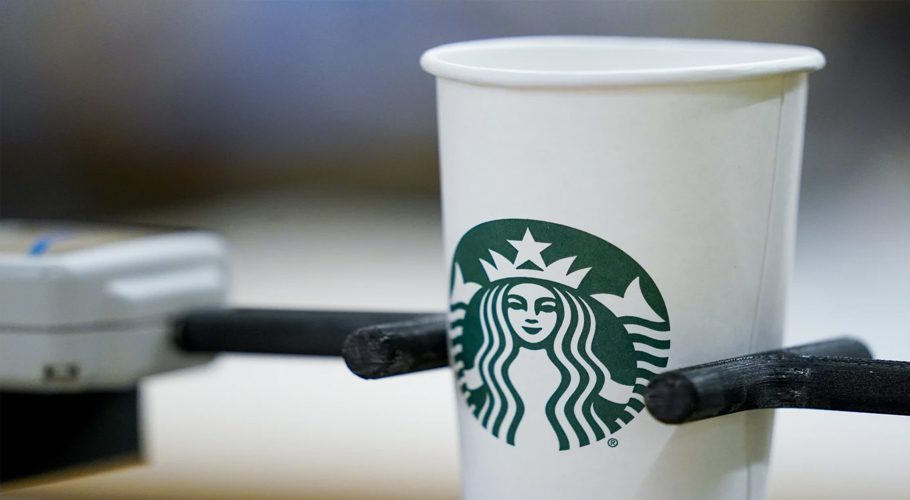 A single-use cup undergoes a rigidity test at the Tryer Center at Starbucks headquarters, Wednesday, June 28, 2023, in Seattle. (AP Photo/Lindsey Wasson)