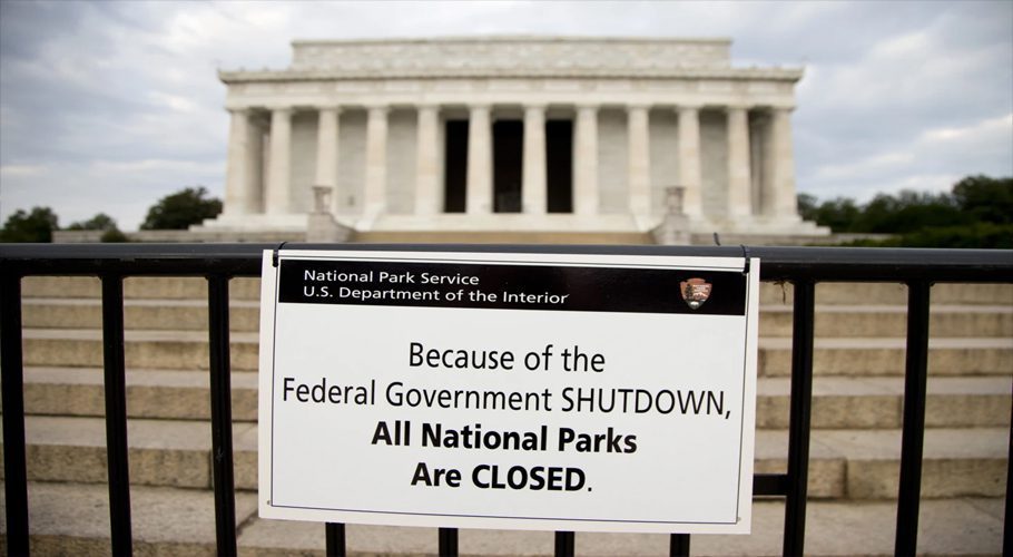 A sign reading "Because of the Federal Government SHUTDOWN All National Parks are Closed" is posted on a barricade in front of the Lincoln Memorial in Washington, Oct. 1, 2013. The federal government is heading toward a shutdown that will disrupt many services, squeeze workers and roil politics. Credit: AP/Carolyn Kaster