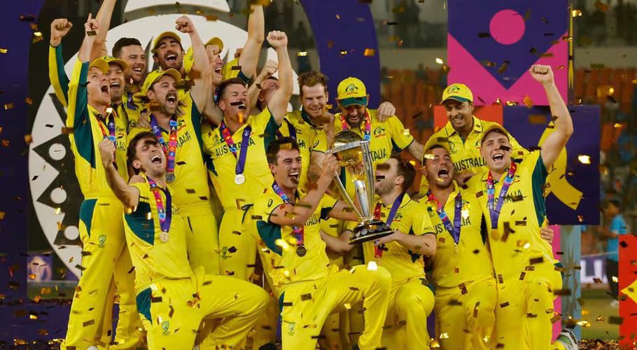 Cricket - ICC Cricket World Cup 2023 - Final - India v Australia - Narendra Modi Stadium, Ahmedabad, India - November 19, 2023 Australia's Pat Cummins celebrates with the trophy and teammates after winning the ICC Cricket World Cup REUTERS/Adnan Abidi Acquire Licensing Rights