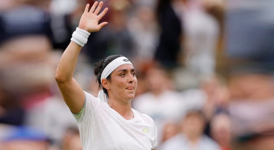 Tennis - Wimbledon - All England Lawn Tennis and Croquet Club, London, Britain - July 4, 2023 Tunisia’s Ons Jabeur celebrates winning her first round match against Poland’s Magdalena Frech REUTERS/Andrew Couldridge Acquire Licensing Rights