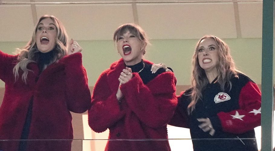 Taylor Swift, center, cheers during the second half of an NFL football game between the Kansas City Chiefs and Green Bay Packers, Sunday, Dec. 3, 2023 in Green Bay, Wis. (AP Photo/Morry Gash)