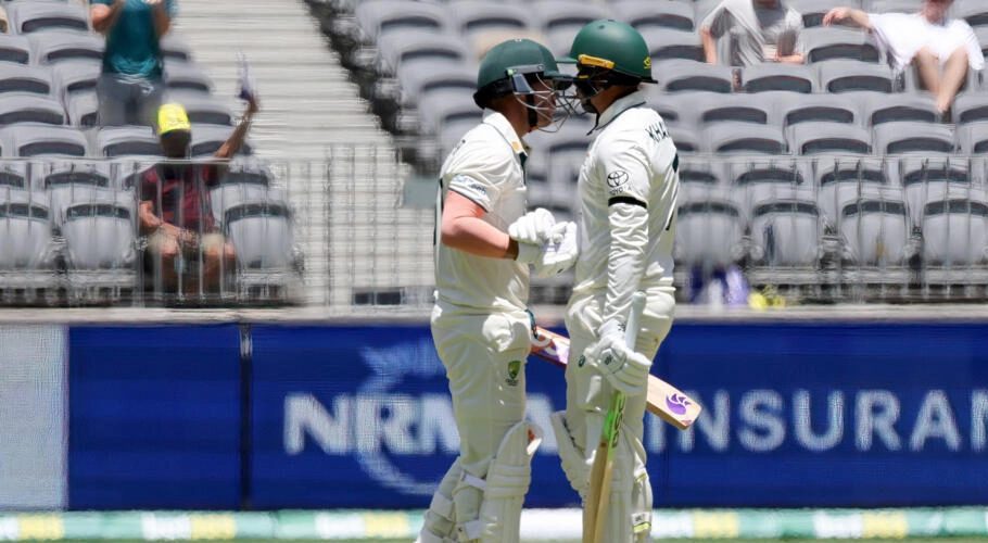 Usman Khawaja (R) wore a black armband on Thursday © COLIN MURTY / AFP