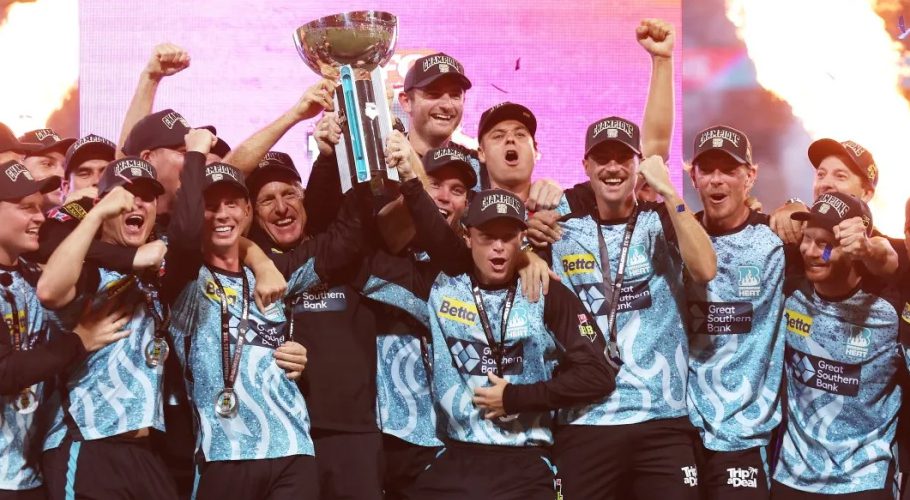 Brisbane Heat celebrate with the BBL trophy•Jan 24, 2024•Cricket Australia/Getty Images