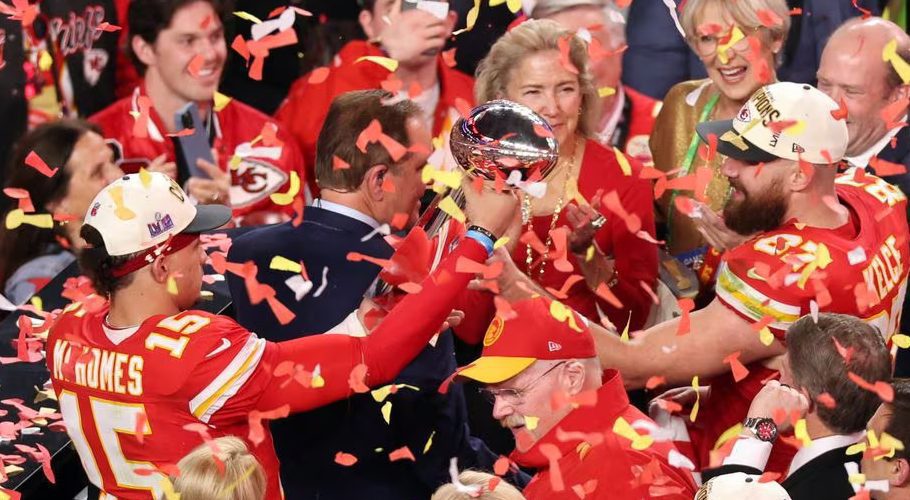 Football - NFL - Super Bowl LVIII - Kansas City Chiefs v San Francisco 49ers - Allegiant Stadium, Las Vegas, Nevada, United States - February 11, 2024 Kansas City Chiefs' Patrick Mahomes and Travis Kelce celebrate with the Vince Lombardi Trophy after winning Super Bowl LVIII REUTERS/Mike Blake