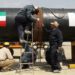 FILE Welders work on a pipeline to transfer natural gas from Iran to Pakistan, in Chabahar on March 11, 2013. — AFP