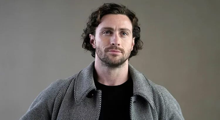 FILE/ Aaron Taylor-Johnson attends the Giorgio Armani women's Fall-Winter 2024-25 collection presented in Milan - 25 February 2024AP Photo/Luca Bruno
