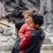 Palestinian children react near the site of an Israeli strike on a house, amid the ongoing conflict between Israel and the Palestinian Islamist group Hamas, in Rafah, in the southern Gaza Strip, March 24, 2024. REUTERS/Mohammed Salem