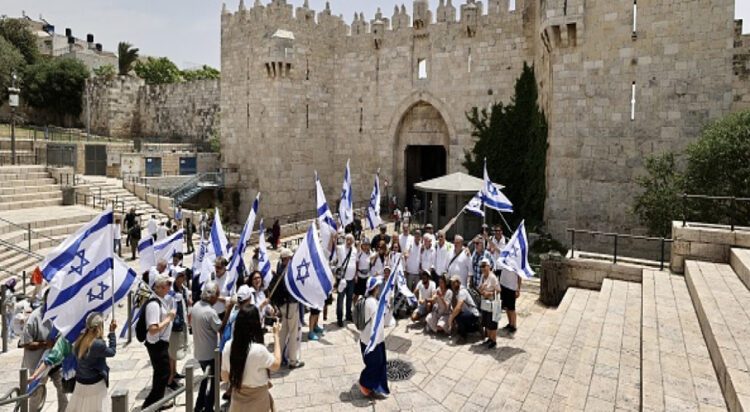 Extremist settlers raised Israeli flags inside Al-Aqsa in an act of provocation against Palestinians [Getty/file photo]