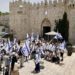 Extremist settlers raised Israeli flags inside Al-Aqsa in an act of provocation against Palestinians [Getty/file photo]